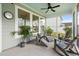 Inviting back porch with comfortable seating, ceiling fan, and serene views at 347 Ripple Park Dr, Summerville, SC 29486