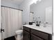 Bright bathroom features a shower-tub combo with a modern vanity and neutral color scheme at 347 Ripple Park Dr, Summerville, SC 29486