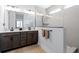 Modern bathroom featuring a double vanity, large mirror and an enclosed glass shower at 347 Ripple Park Dr, Summerville, SC 29486
