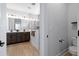 Stylish bathroom featuring a double sink vanity, wood-look flooring, and a separate water closet for added privacy at 347 Ripple Park Dr, Summerville, SC 29486