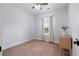 Minimalist bedroom with a large window, carpet, and neutral tones creating a serene and inviting space at 347 Ripple Park Dr, Summerville, SC 29486