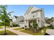 Charming two-story home featuring a welcoming front porch and landscaped front yard at 347 Ripple Park Dr, Summerville, SC 29486