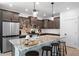 Modern kitchen with stainless steel appliances, granite countertops, and a spacious island with seating at 347 Ripple Park Dr, Summerville, SC 29486