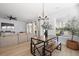 Inviting living room area with hardwood floors, fan, and open to the dining area at 347 Ripple Park Dr, Summerville, SC 29486