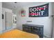 Cozy bedroom with a dresser, a hanging motivational sign, and orange comforter on the bed at 357 Beachgrass Ln, Summerville, SC 29486