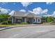 Community clubhouse showcasing a covered seating area, well-maintained landscaping, and welcoming exterior at 357 Beachgrass Ln, Summerville, SC 29486