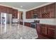 Granite countertop, stainless steel appliances, and ample cabinet space create a chef's dream kitchen at 357 Beachgrass Ln, Summerville, SC 29486