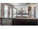 Spacious kitchen island with a sink, stainless steel dishwasher and view of the stairs and living room at 357 Beachgrass Ln, Summerville, SC 29486