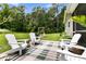 Inviting outdoor space with patio, fire pit, and swing set offers a relaxing retreat at 3789 Tupelo Branch Row, Mount Pleasant, SC 29429