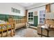 Charming Bedroom decorated with a crib, rocking chair, rug, and natural light from large windows at 3789 Tupelo Branch Row, Mount Pleasant, SC 29429