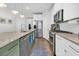Well-equipped kitchen featuring stainless steel appliances, granite countertops, and ample cabinet space at 3789 Tupelo Branch Row, Mount Pleasant, SC 29429