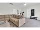 Spacious living room with comfortable seating, a ceiling fan, carpeted floors, and neutral decor at 3789 Tupelo Branch Row, Mount Pleasant, SC 29429