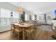 Open-concept living space with hardwood floors, stylish decor, and great natural light at 3789 Tupelo Branch Row, Mount Pleasant, SC 29429