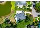 Aerial view of the property highlighting the backyard deck with serene water views at 391 Evian Way, Mount Pleasant, SC 29464