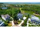 Gorgeous aerial view of the neighborhood, displaying the beautiful landscaping and marsh views at 391 Evian Way, Mount Pleasant, SC 29464