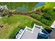 Aerial view of the back deck overlooking the lush backyard and pond at 391 Evian Way, Mount Pleasant, SC 29464