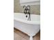 Close-up of a stylish bathtub with ornate fixtures and elegant detailing at 391 Evian Way, Mount Pleasant, SC 29464