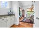 Dining area with a wood table and chairs, complemented by natural light and classic decor at 391 Evian Way, Mount Pleasant, SC 29464