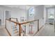 Upper-level view of the foyer with staircase and natural light at 391 Evian Way, Mount Pleasant, SC 29464