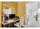 Office features a desk with a computer and printer with an open doorway view to the hallway at 391 Evian Way, Mount Pleasant, SC 29464
