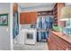 Spacious walk-in closet with custom shelving and laundry machines at 391 Evian Way, Mount Pleasant, SC 29464