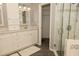 Bathroom with double sinks, a shower, and tiled floors at 407 Thomaston Ave, Summerville, SC 29485