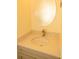 A bathroom with a white granite countertop and an oval mirror at 407 Thomaston Ave, Summerville, SC 29485