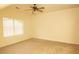 Bedroom featuring neutral walls, carpet and large window with blinds at 407 Thomaston Ave, Summerville, SC 29485