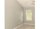 A bedroom with gray walls, wood-look floors, a ceiling fan and a window for natural light at 407 Thomaston Ave, Summerville, SC 29485