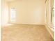 Bright and spacious living room with neutral carpet and large windows providing natural light at 407 Thomaston Ave, Summerville, SC 29485