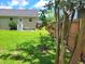 Spacious backyard with green lawn and a patio area, great for outdoor entertaining and relaxation at 4457 Rice Mill Dr, North Charleston, SC 29420