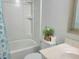 Bathroom featuring a bathtub/shower with a white shower curtain and a white vanity at 4457 Rice Mill Dr, North Charleston, SC 29420