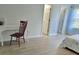 Bedroom featuring a writing desk with a chair, and two doors leading to other rooms at 4457 Rice Mill Dr, North Charleston, SC 29420
