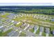 Community aerial view featuring homes surrounding a lake and lush green forest, providing a serene and picturesque setting at 494 Pender Woods Dr, Summerville, SC 29486