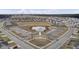 Panoramic aerial shot of a community pool, pool house, and playground surrounded by homes and manicured landscaping at 494 Pender Woods Dr, Summerville, SC 29486