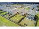 Aerial view of spacious backyards with play equipment, offering ample outdoor space at 494 Pender Woods Dr, Summerville, SC 29486
