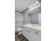Bathroom featuring a white vanity, gray walls, a mirror, a shower, and toilet at 494 Pender Woods Dr, Summerville, SC 29486