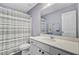 Bathroom featuring a white vanity, gray walls, a mirror, a shower, and toilet at 494 Pender Woods Dr, Summerville, SC 29486