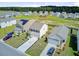 Aerial shot showcasing homes with attached garages and green lawns at 494 Pender Woods Dr, Summerville, SC 29486