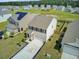 Aerial view of two-story homes with manicured lawns and driveways at 494 Pender Woods Dr, Summerville, SC 29486