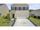 Charming two-story home with a large driveway, black shutters, and well-maintained landscaping at 494 Pender Woods Dr, Summerville, SC 29486