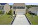 Attractive two-story home with a spacious driveway, tidy lawn, and classic black shutter accents at 494 Pender Woods Dr, Summerville, SC 29486