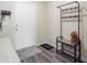 Cozy foyer featuring a practical coat rack, stylish rug, and a clean, bright entrance at 494 Pender Woods Dr, Summerville, SC 29486