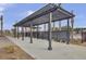 Elegant gazebo in a community area with palm trees and decorative fencing enhancing the charm of this outdoor space at 494 Pender Woods Dr, Summerville, SC 29486