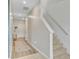 Hallway with staircase, neutral paint and flooring, and a stylish rug at 494 Pender Woods Dr, Summerville, SC 29486