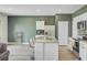 Kitchen island with granite countertop and stainless steel appliances, open floor plan at 494 Pender Woods Dr, Summerville, SC 29486