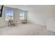 Sitting room featuring natural light with two comfy chairs and a flat screen TV at 494 Pender Woods Dr, Summerville, SC 29486