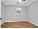Light-filled bedroom with hardwood floors, a ceiling fan, and a bright window at 507 Stinson Dr # 4G, Charleston, SC 29407