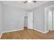 Well-lit bedroom boasting hardwood floors and neutral colored walls at 507 Stinson Dr # 4G, Charleston, SC 29407