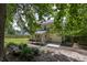 Exterior view of home featuring a fenced yard, a covered patio, and mature trees at 5105 Parrum Ct, Summerville, SC 29485